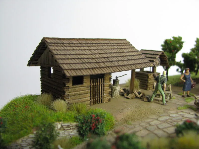 Kozí chliev a drevník